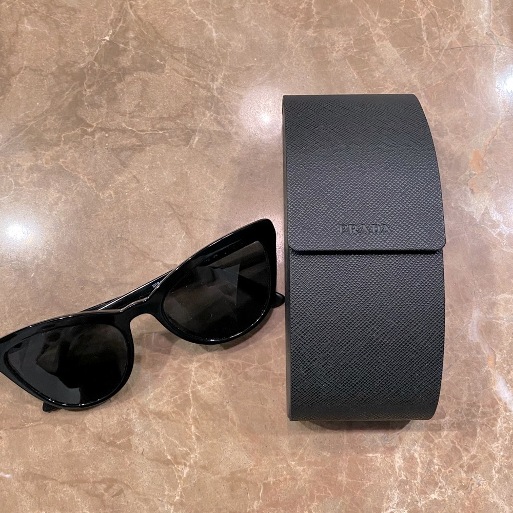 Prada cat eye sunglasses, new with case and cleaning cloth, SPR01V